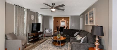 Stretch out and relax in our big, comfy living space—perfect for movie nights, casual hangouts, or quiet mornings with coffee. Thoughtfully furnished with plush seating and cozy vibes, it’s your home away from home, made for comfort and connection.