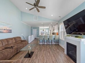 Couch, Furniture, Ceiling Fan, Indoors, Building