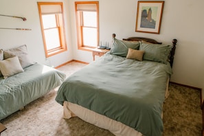 2nd bedroom with queen size bed and day bed.