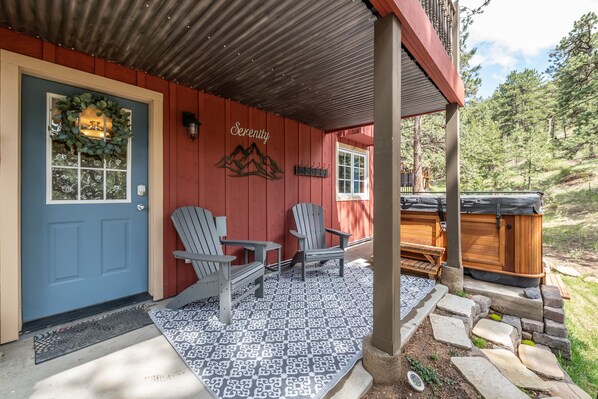 Lower level back patio - quick access to hot tub and fire pit.