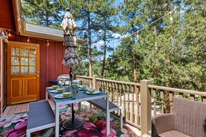 Side deck facing Northwest. Outdoor eating for 6.