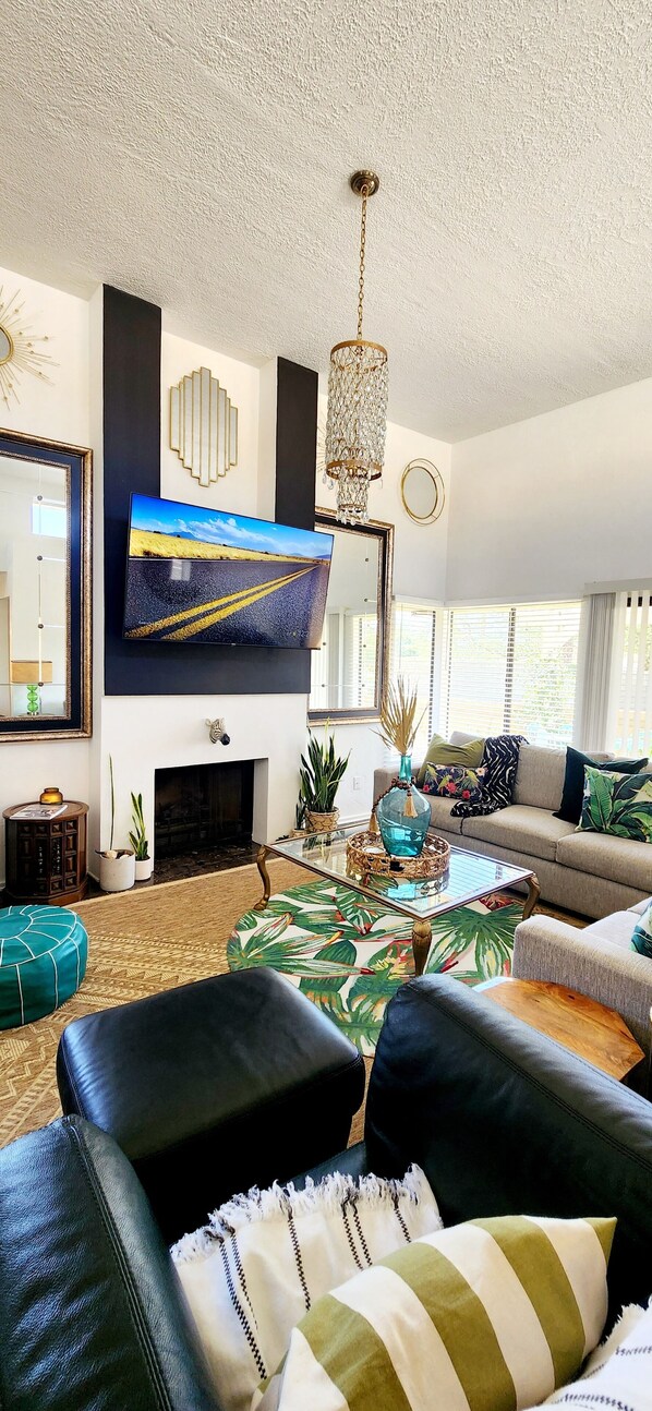 80 " flat screen , cozy living room with fireplace and sunset mountain views!