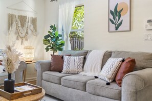 This home will not bore you! Aside from its relaxing ambiance, it also comes with books, a 65-inch television with soundbar speakers, and lightning-fast WiFi.