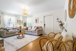Whether it's a movie night with loved ones or simply lounging and enjoying each other's company, our palm-themed living area is the perfect gathering spot for quality time and making cherished memories.