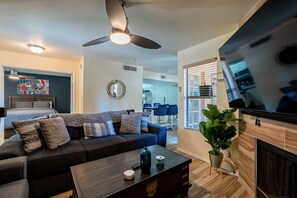 Living Room with 75" Samsung QLED TV and Surround Sound