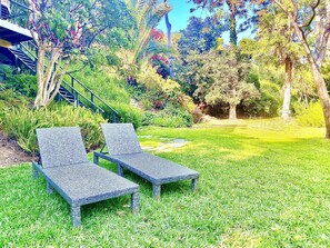 Lounge in the yard surrounded by a secluded oasis