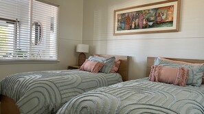 Our Sky Blue twin room features original watercolours by Sharon Peterkin.