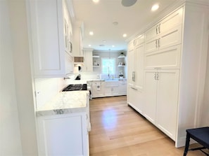 Pristine Kitchen, fully appointed.  Honed Marble Counter Tops.