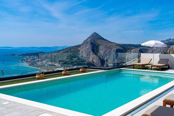 New! Villa BAMM with heated 36sqm pool, 5 en-suite bedrooms and panoramic sea views
