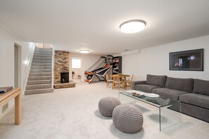 A great activity room with the perfect puzzle/poker/game table