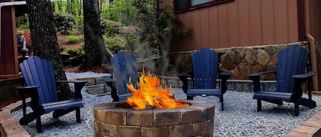 Awesome fire pit area on the side of house, totally private, a guest favorite.