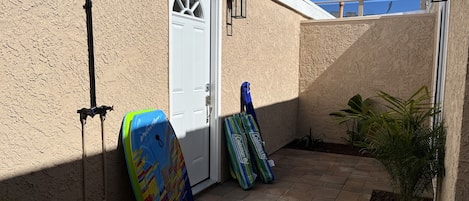 front patio with outdoor hot/cold shower