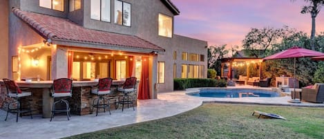 Private backyard with bar and pool