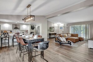Open layout - Kitchen, dining, and living area