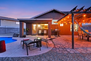 Covered patio adorned with string lights!