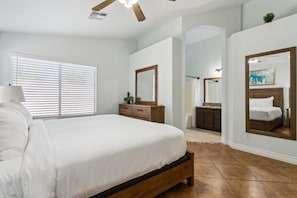 Master bedroom with a king bed