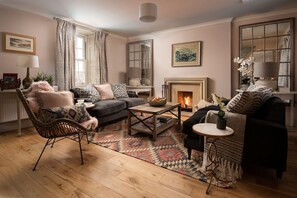 Bughtrig Cottage - a collection of original William Ramsay artworks adorn the walls