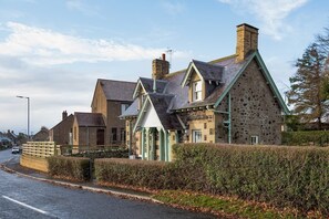Bughtrig Cottage - the cottage sits just off the main road leading through Leitholm village