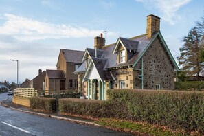 Bughtrig Cottage - the cottage sits just off the main road leading through Leitholm village