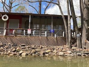 Water side view of the fishing deck along the cabin.