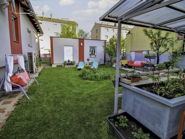 Plant, Property, Building, Sky, Grass, Architecture, Land Lot, Chair, Cloud, Shade