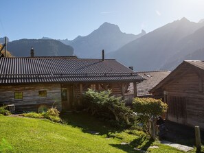 Sky, Plant, Mountain, Building, Nature, Window, Highland, Natural Landscape, Sunlight, House