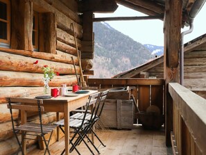 Furniture, Table, Property, Building, Sky, Window, Plant, Wood, Flowerpot, Architecture