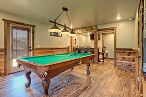 Downstairs gaming area w/ pool table. Time to polish your game!