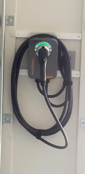EV Charger in Garage - Located in the garage is an electric car charger added for your convenience.