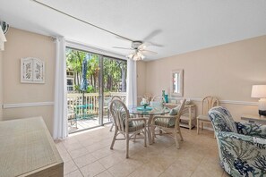 Dining area with a view - Dinning table next to the balcony/porch