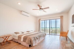 Bedroom 1 is the master suite upstairs with an ocean view, upstairs