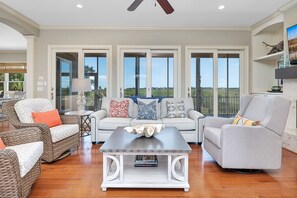 Beautiful living space with incredible views of the marsh.