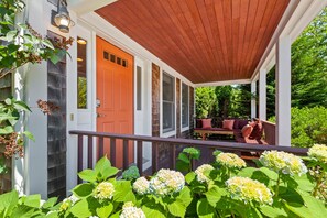 Front porch and entry (First floor). Outdoor seating area, automated deadbolt