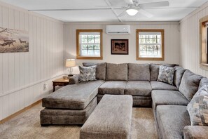 Living room with Temperature control AC/ Heat and view to back yard area.