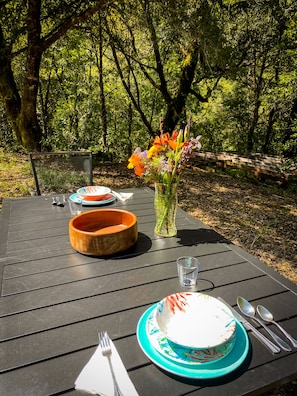 We put out fresh cut flowers each day from our garden. Dining ware provided