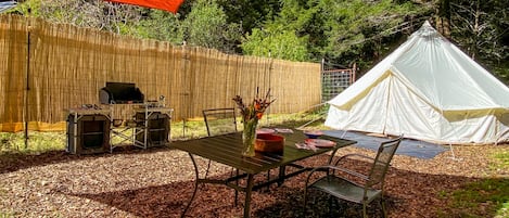The Orchard site features a 16 foot diameter round tent with privacy fencing. 