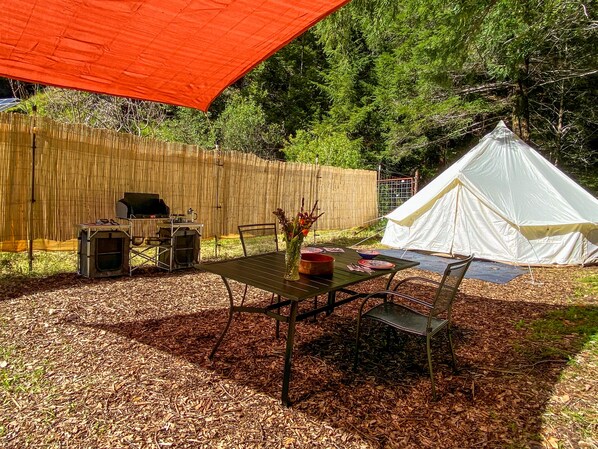 The Orchard site features a 16 foot diameter round tent with privacy fencing. 