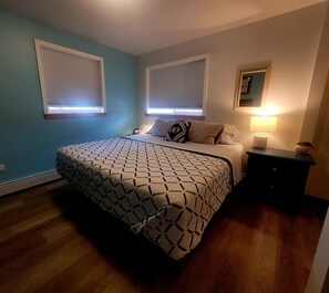 Bedroom 2 with black out shades closed. 