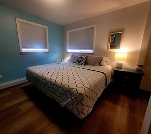 Bedroom 2 with black out shades closed.
