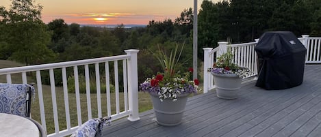 Summer sunset over East Bay from back deck