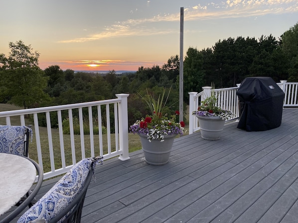 Summer sunset over East Bay from back deck