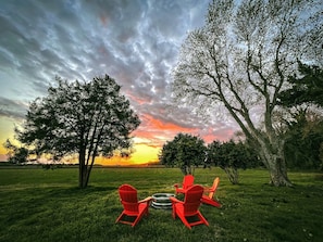 Front yard firepit with westerly sunset-facing views.