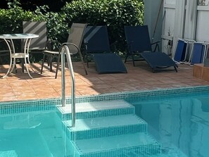 We have created new graduated steps and a new pool. lined with aquamarine glass