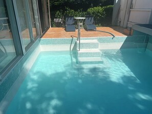 Your brand new pool lines with blue glass! 
Gorgeous!
