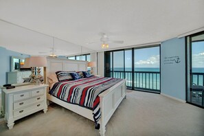 Master Oceanfront Bedroom with stunning ocean views and balcony.