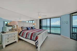 Master Oceanfront Bedroom with stunning ocean views and balcony.
