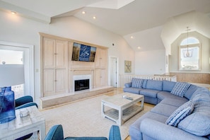 Top-Level Living Room with Deck Access