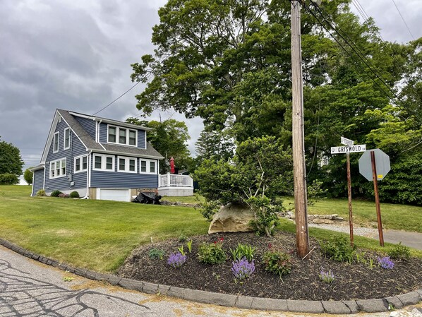 Located on corner, property includes a large well yard for your enjoyment.