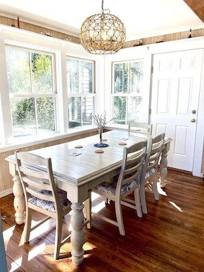 The dining room table can seat your complete group (up to 8)