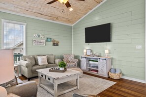 Living room with a warm feeling to relax and many blankets to cuddle up with.